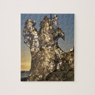 Goldener Sonnenaufgang durch Eisberge Puzzle