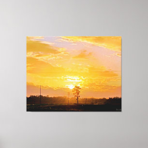 Goldener Sonnenuntergang über ländlicher Landschaf Leinwanddruck