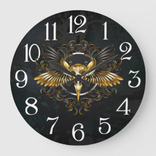 Goldener Vogelschädel auf schwarzem Hintergrund Große Wanduhr