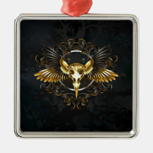 Goldener Vogelschädel auf schwarzem Hintergrund Ornament Aus Metall