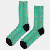 Goldenes Art-Deco-Muster auf blau-grün Socken (Linkes Detail)