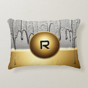 Goldenes Emblem mit tropfender Silberfarbe Dekokissen