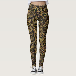 Goldenes florales Barockmuster auf Schwarz Leggings
