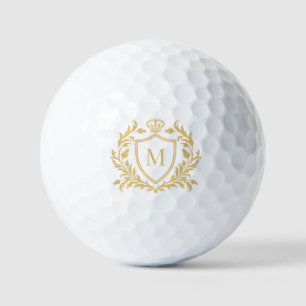 Goldenes Heraldik-Wappenkronenmonogramm Golfball