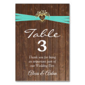 Goldenes Herz mit türkisfarbenem Band auf Stallhol Tischnummer (Vorderseite)