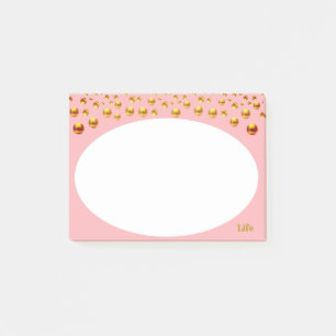 Goldenes Konfetti auf Rosa Post-it Klebezettel