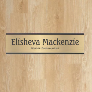 Goldenes Namensschild für das Büro der Schulpsycho