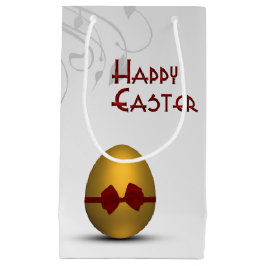 Goldenes Ostereier mit braunem, floralfarbenem Mus Kleine Geschenktüte