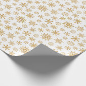 Goldenes Schneeflocken-Muster im weißen Hintergrun Geschenkpapier (Ecke)