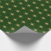 Goldenes Sternmuster auf grünem Hintergrund Geschenkpapier (Ecke)