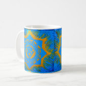 goldenes Tantrylesymbol auf blau Kaffeetasse (Vorderseite Links)