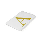Goldfarbene benutzerdefinierte Monogramm-Anfangsbu Badematte (Schrägansicht)