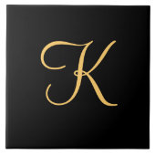 Goldfarbene erste K auf schwarzem Hintergrund Fliese (Vorderseite)