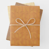 goldfarbene Halterungen mit hellfarbenem Hintergru Geschenkpapier Set (Beispiel)