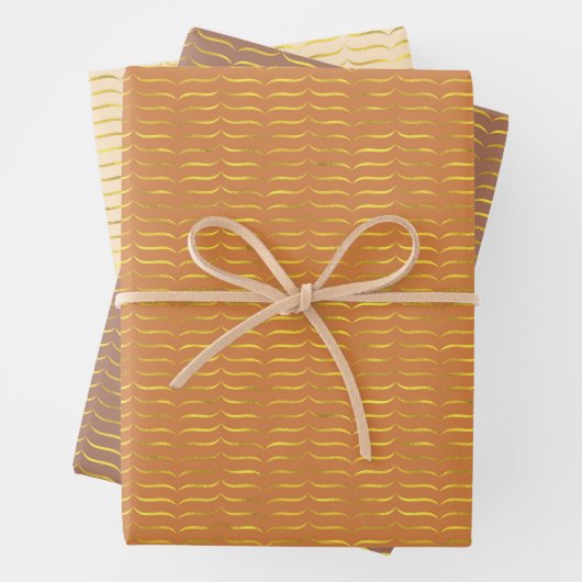 goldfarbene Halterungen mit hellfarbenem Hintergru Geschenkpapier Set (Beispiel)