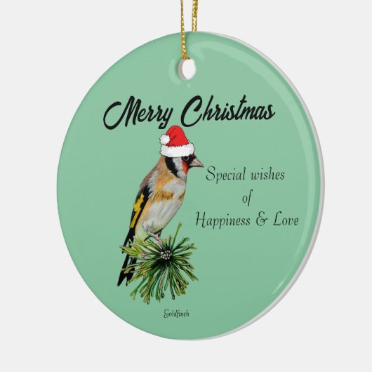 Goldfinch mit einer Weihnachtsmannmütze Keramik Ornament (Links)