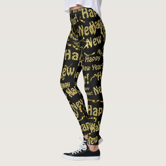 goldgelber, neuer Jeffertext in schwarzen Leggings (Links)