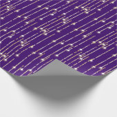 Goldglanzlichter auf Lila Geschenkpapier (Ecke)