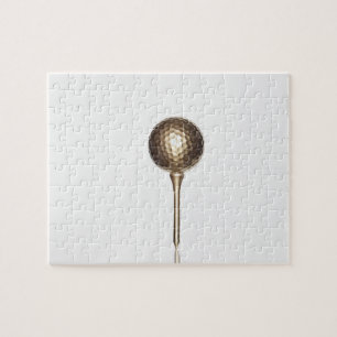 GoldGolfball und -t-Stück Puzzle