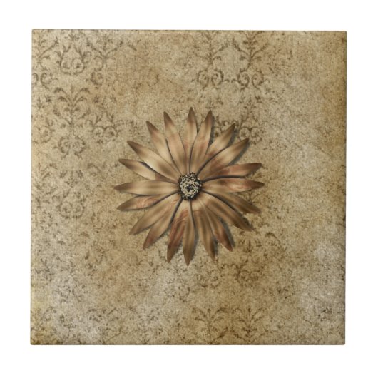 Goldmetallische Blume auf Beige Fliese (Vorderseite)