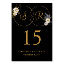 Goldmonogramm für die erste Hochzeit mit schwarzem