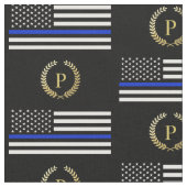 Goldmonogramm-Polizei kennzeichnet Stoff (Nahaufnahme)