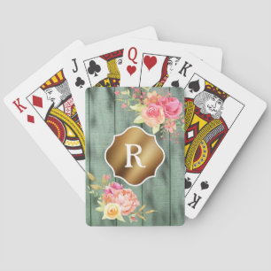Goldmonogramm rosa Blumen rustikales grünes Holz Spielkarten
