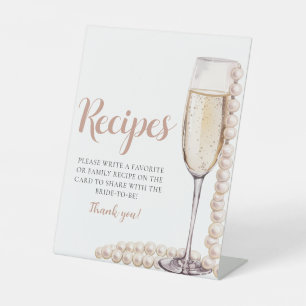 Goldperlen und Prosecco Champagnerrezepte Zeichen Sockelschild