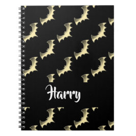 Goldschläger auf schwarz notizblock