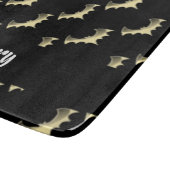 Goldschläger auf schwarz schneidebrett (Ecke)