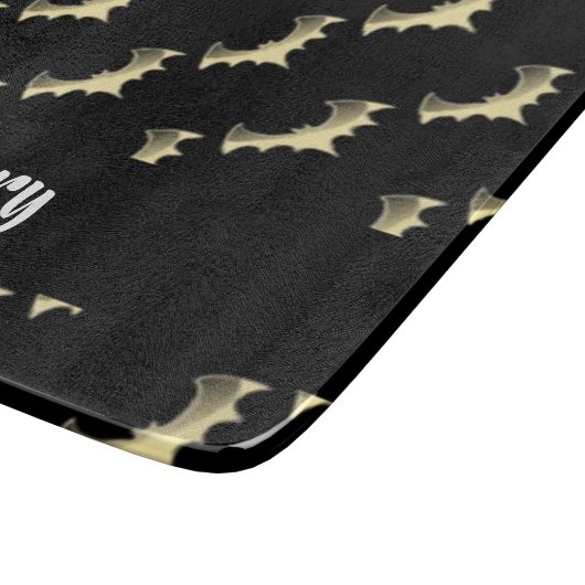 Goldschläger auf schwarz schneidebrett (Ecke)