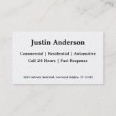 Goldschlüsselluxusbauschlosser hält Visitenkarte (Rückseite)