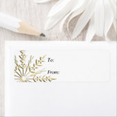 Goldschneeflocke auf dem weißen Weihnachtsgeschenk (Insitu)