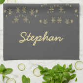 Goldschneeflocken auf grau geschirrtuch (Gefaltet)