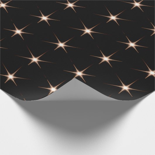 Goldstar-Fackeln auf schwarz Geschenkpapier (Ecke)