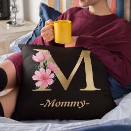 Goldtypografie von Mommy mit Blume schwarz Kissen