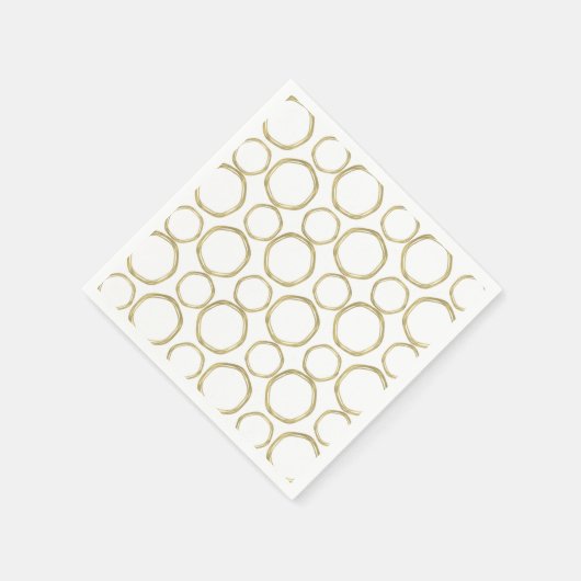 Goldumlaufbahnen auf der weißen, modernen Mode Serviette (Ecke)