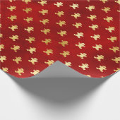 Goldweihnachtskuchen Männer auf Rot Geschenkpapier (Ecke)