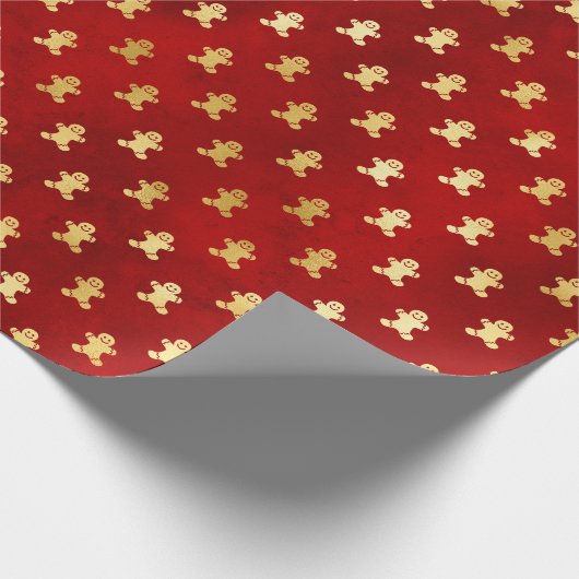 Goldweihnachtskuchen Männer auf Rot Geschenkpapier (Ecke)