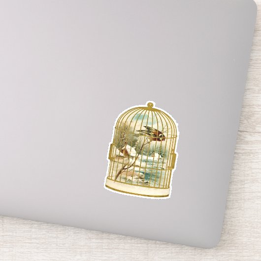 Goldweiße Birdcage mit Vögeln auf dem Schnee der Z Aufkleber (Detail)