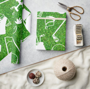 Golf-Ausrüstung auf grünem Gras Hintergrund Geschenkpapier