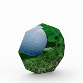 Golf Ball auf dem Grünen Fotoblock (Links)