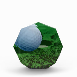 Golf Ball auf dem Grünen Fotoblock