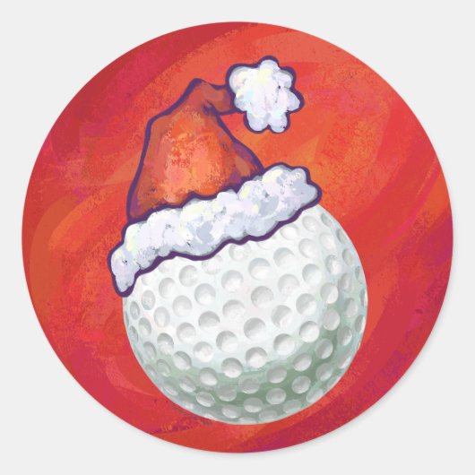 Golf Ball in Weihnachtsmannmütze Runder Aufkleber (Vorderseite)