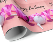 Golf-Ball mit rosa Polka-Punktband in rosa Geschenkpapier (Rolleneckpunkt)