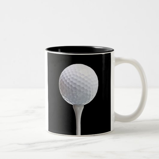 Golf-Ball u. T-Shirt auf Schwarzem - Zweifarbige Tasse (Rechts)