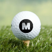 Golf Ball with Black and White Initial Letter Mark (Insitu T-Shirt)