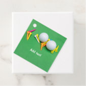Golf ball with color tee on green background geschenkanhänger (Beispiel)