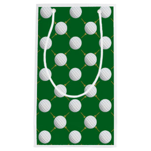 Golf-Bälle und T-Shirts auf Grün Kleine Geschenktüte