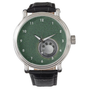 Golf Cup und Ball auf den Grüntönen Armbanduhr